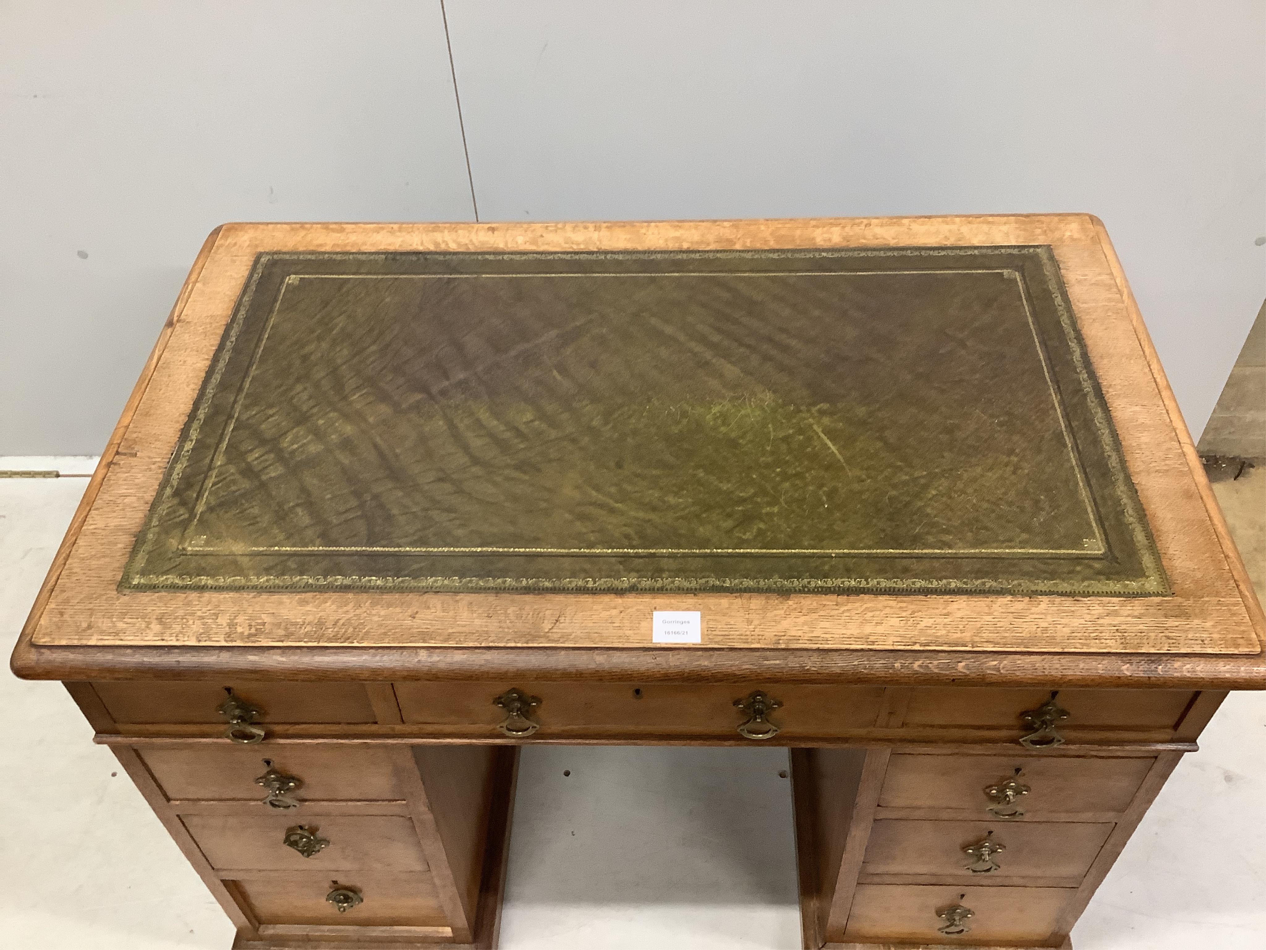 A late Victorian oak pedestal desk, width 106cm, depth 65cm, height 71cm. Condition - fair